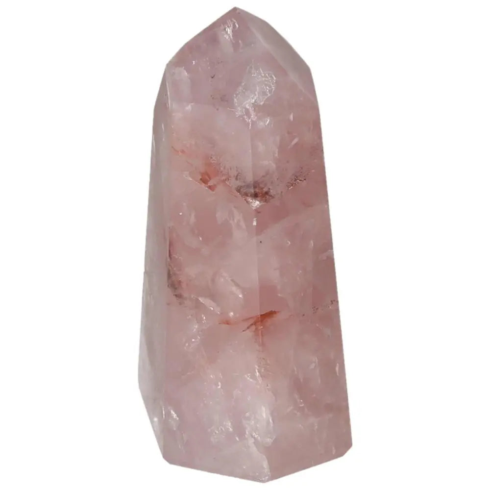 Rose quartz crystal tower with natural inclusions and pale pink hues, showcasing its calming energy properties.