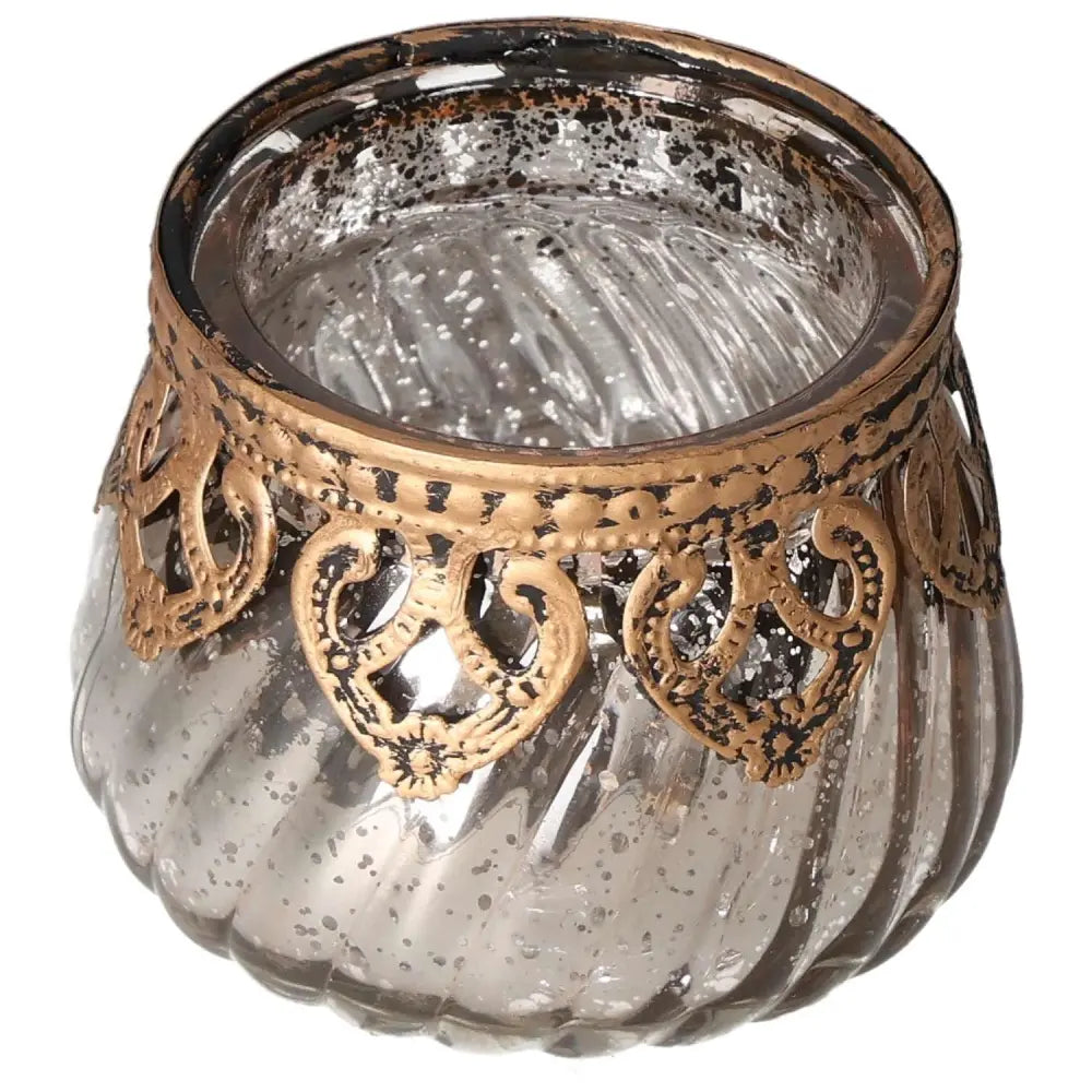 Vintage-inspired glass lantern with intricate gold detailing, perfect for adding elegance and tranquility to any living space.