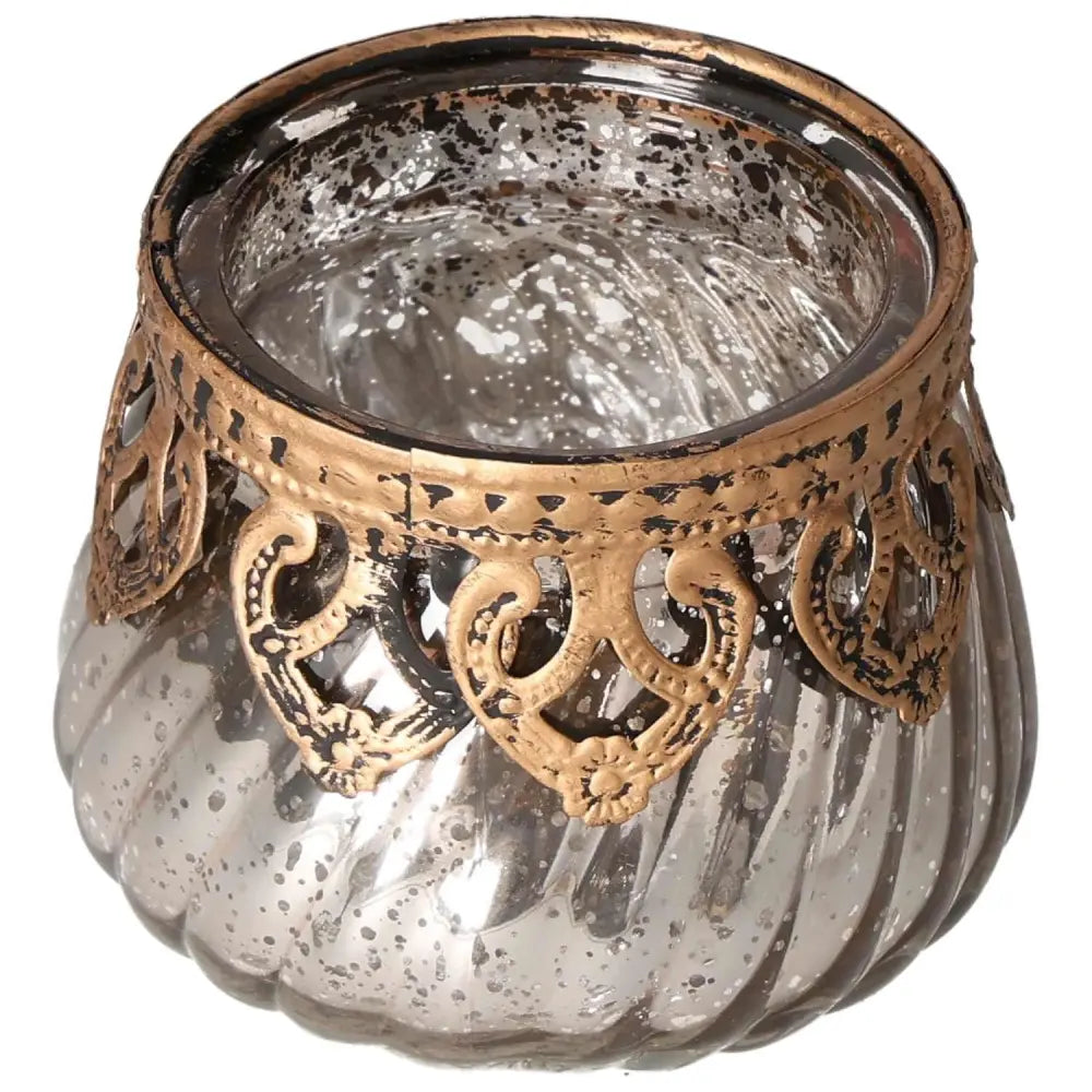 Decorative lantern with intricate gold detailing, enhancing any space with elegance and tranquility.