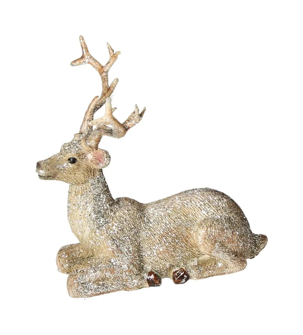 Elegant glittery poly deer sculpture in champagne tone lying gracefully, crafted by Sylvia Crystals for a touch of refined luxury.
