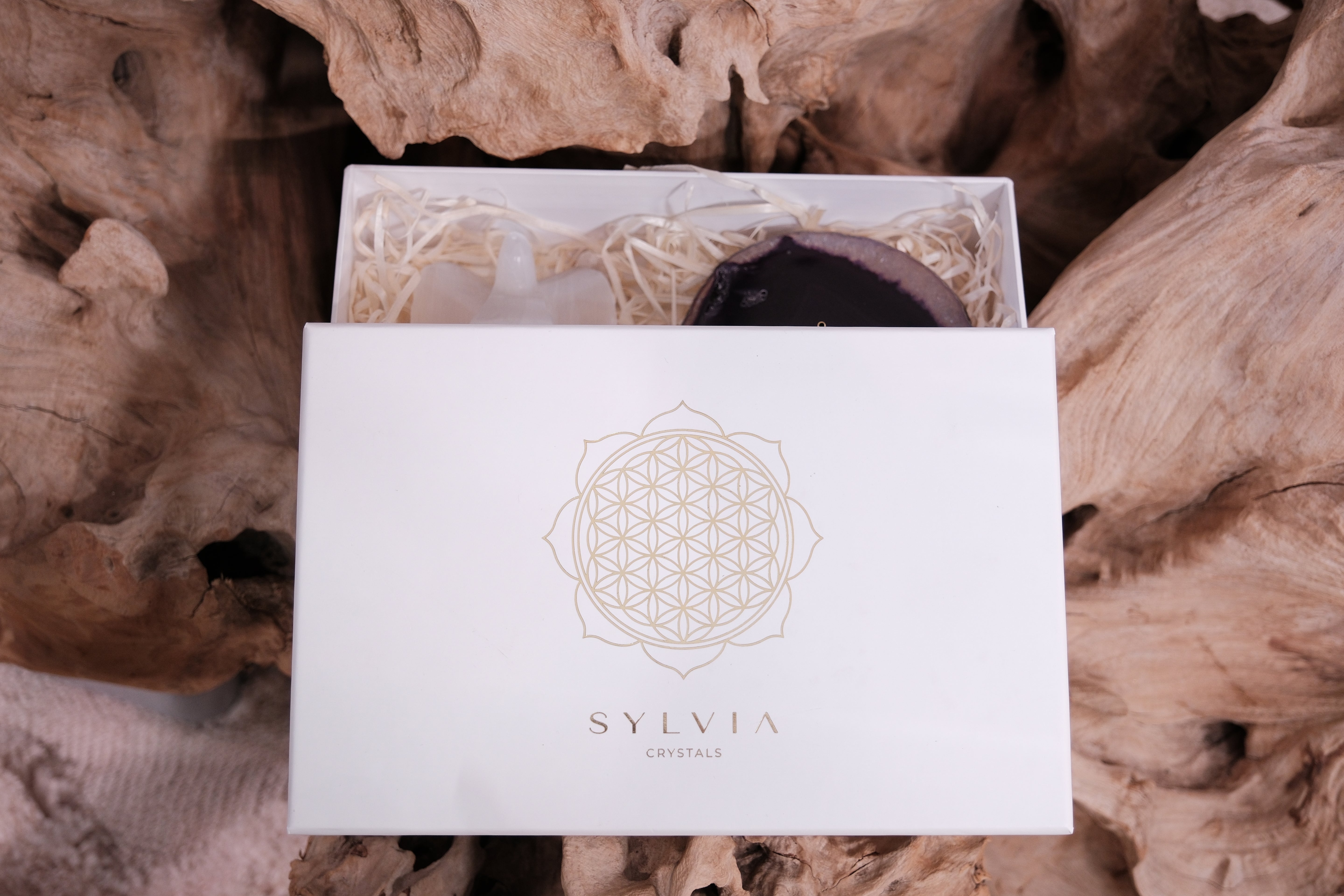 Sylvia Crystals Christmas Gift Box with hand-selected crystals for peace and beauty, featuring elegant packaging.