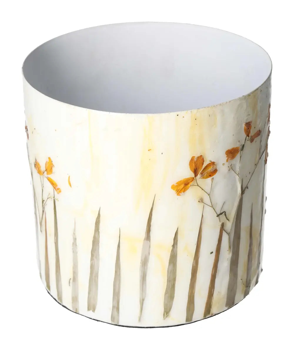 Handcrafted planter with elegant flower motif, measuring 17x17x15, symbolizing nature's beauty by Sylvia for luxury home decor.