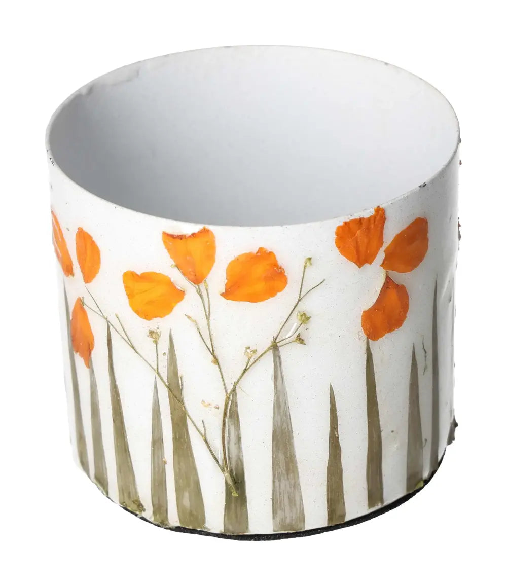 Ivory colored planter with vivid orange flower motif, merging luxury and conscious living, designed by Sylvia Crystals, size 9x9x8.