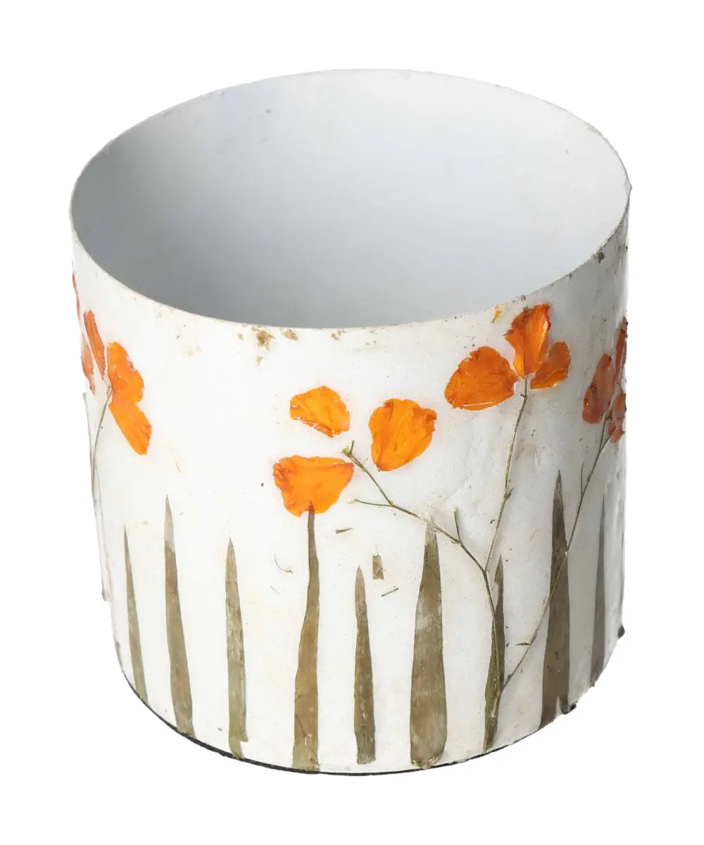 Elegant planter with orange flower motifs, designed by Sylvia Crystals, measuring 11x11x10, ideal for luxurious and conscious living.