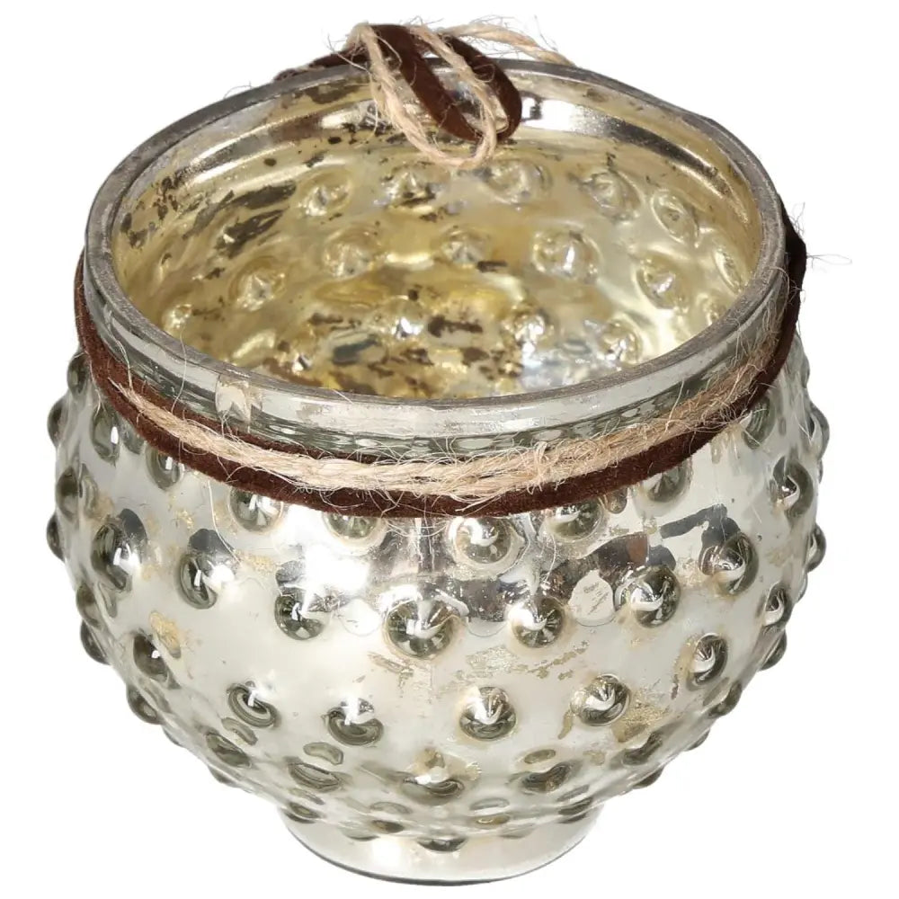 Elegant dimpled glass votive holder with rustic twine accent, perfect for adding warmth and charm to home decor.