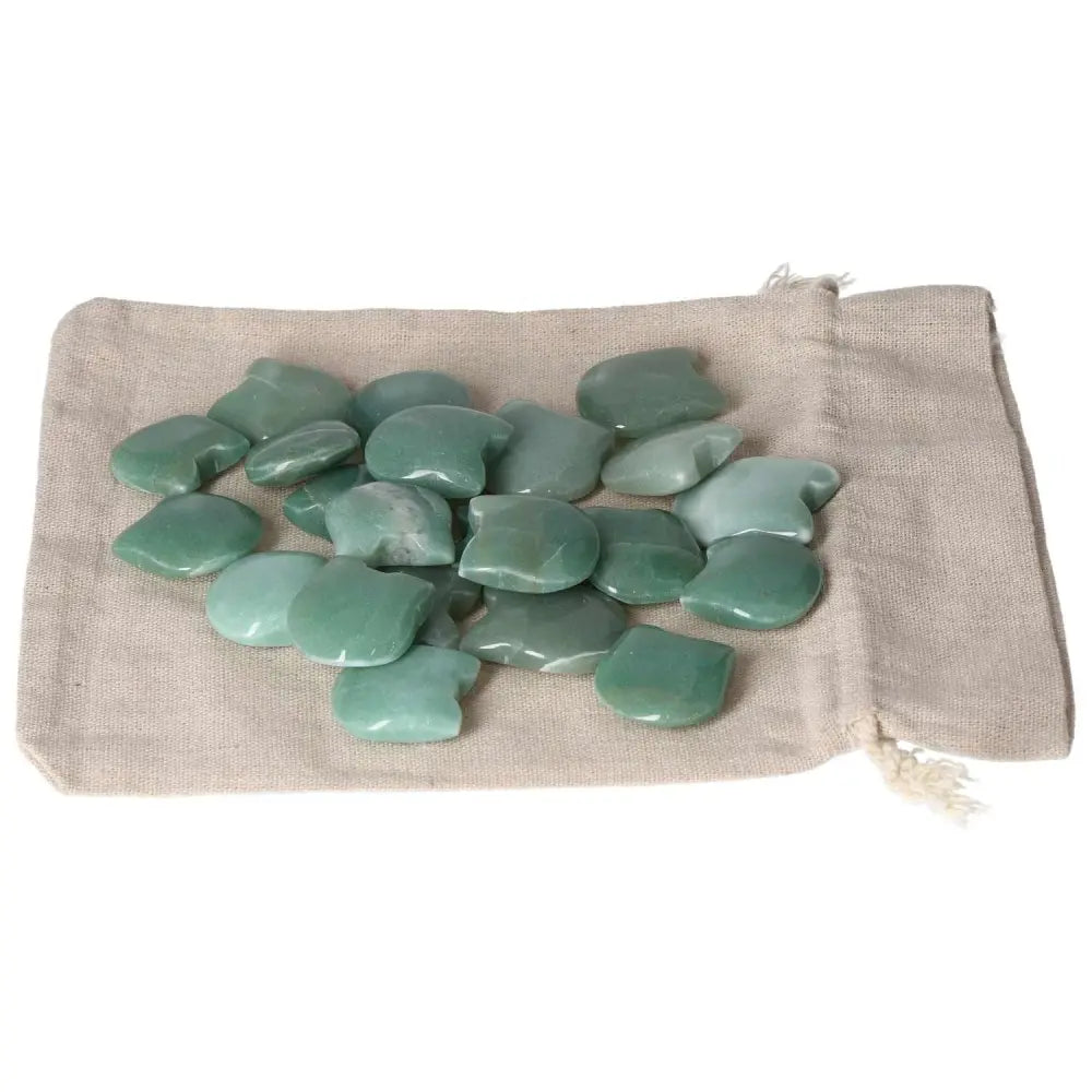 Green Aventurine Small Cat Stones on Beige Cloth for Luck and Prosperity