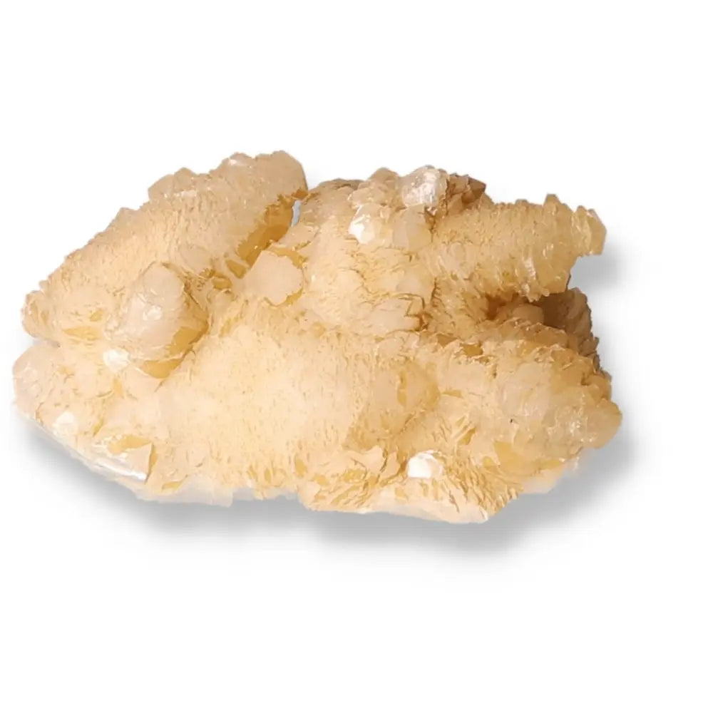 Gyrolite mineral with spherical formations, promoting tranquility and spiritual growth by activating Heart and Crown Chakras.