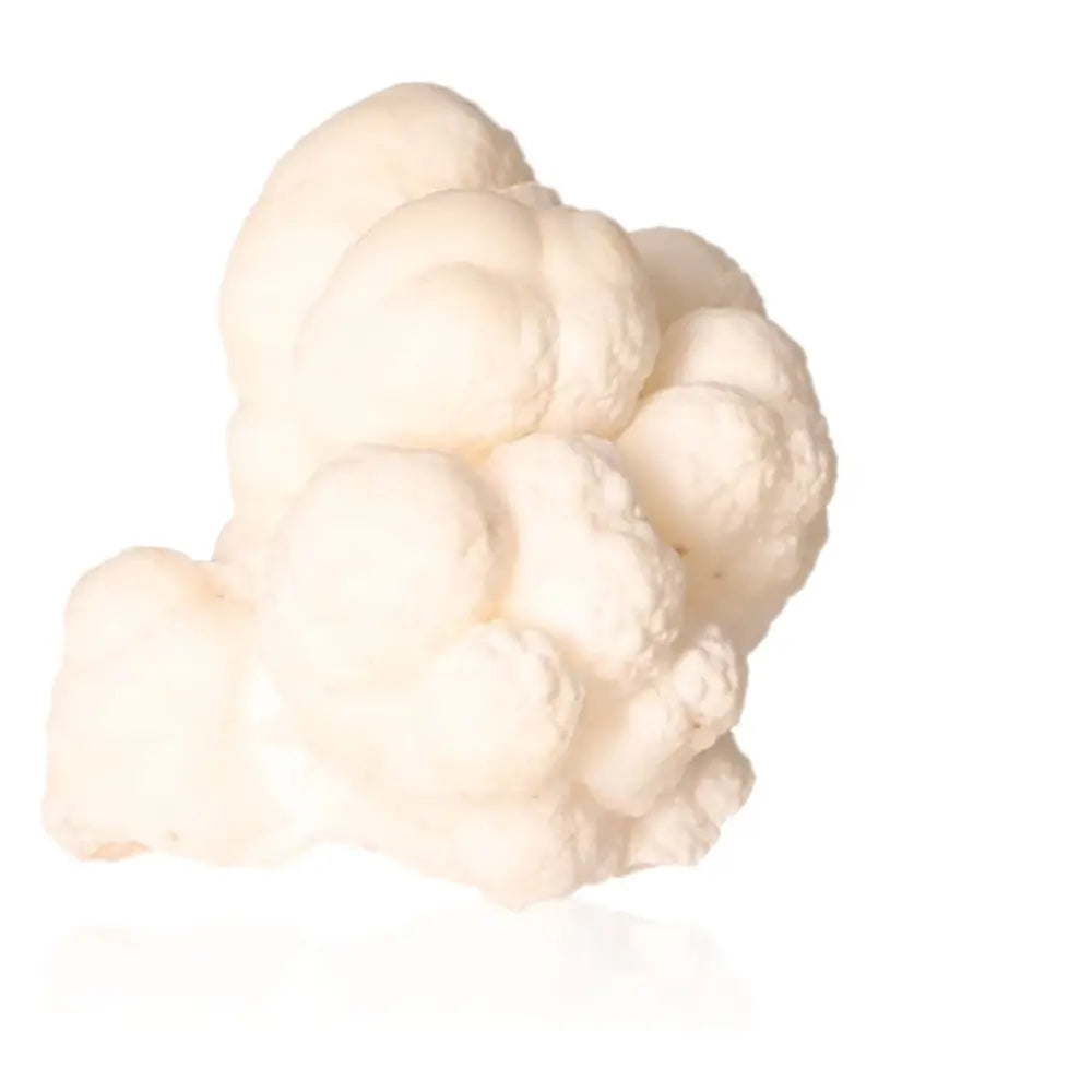 Alt Tag: Ighoud Calcite Druze showing unique earthy formation from Morocco, known for grounding and spiritual growth benefits.