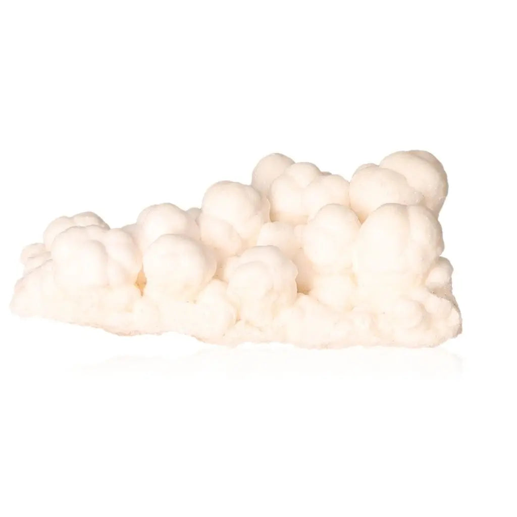 Ighoud Calcite Druze mineral with warm earthy tones, showcasing unique natural shapes and grounding energy from Morocco.