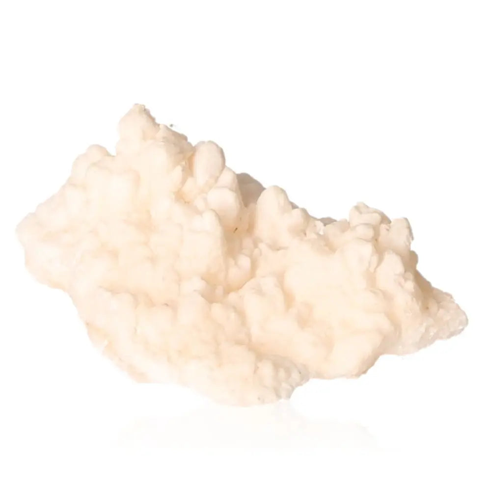 Ighoud Calcite Druze from Morocco, featuring unique shapes and warm tones, known for grounding and spiritual growth.