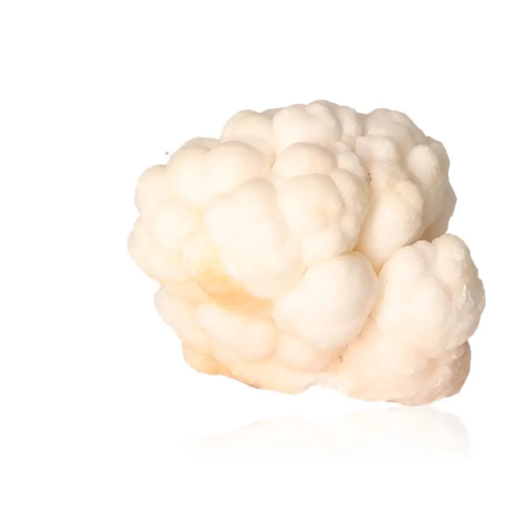 Ighoud Calcite Druze from Morocco, showcasing warm earthy tones, known for grounding energy and spiritual transformation potential.