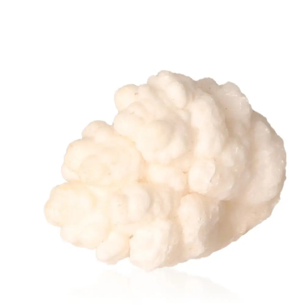 Ighoud Calcite Druze from Morocco, featuring unique mineral formation with warm earthy tones, representing grounding and transformation energy.