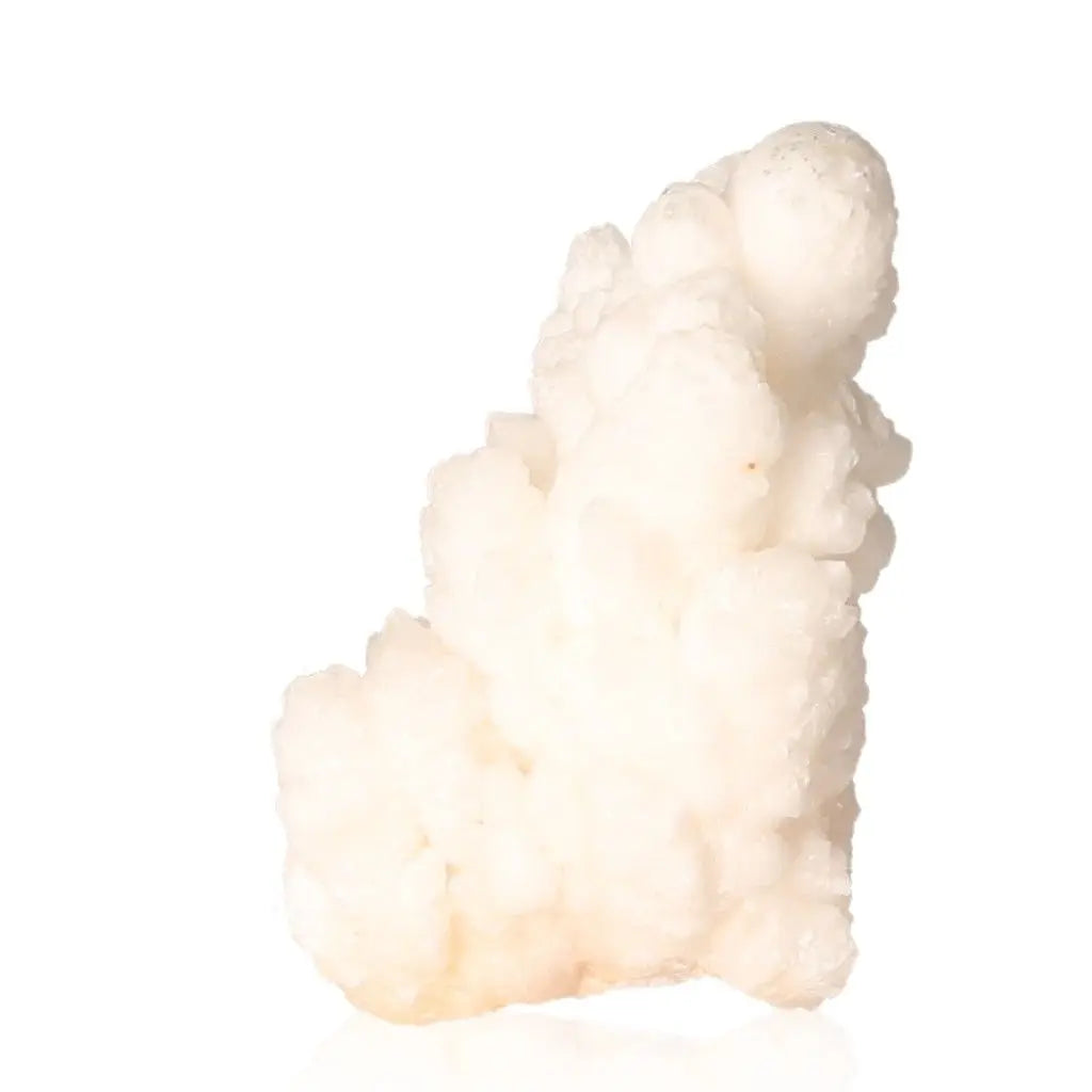 Ighoud Calcite Druze from Morocco, showcasing natural earthy tones and unique shapes, known for grounding and stability.