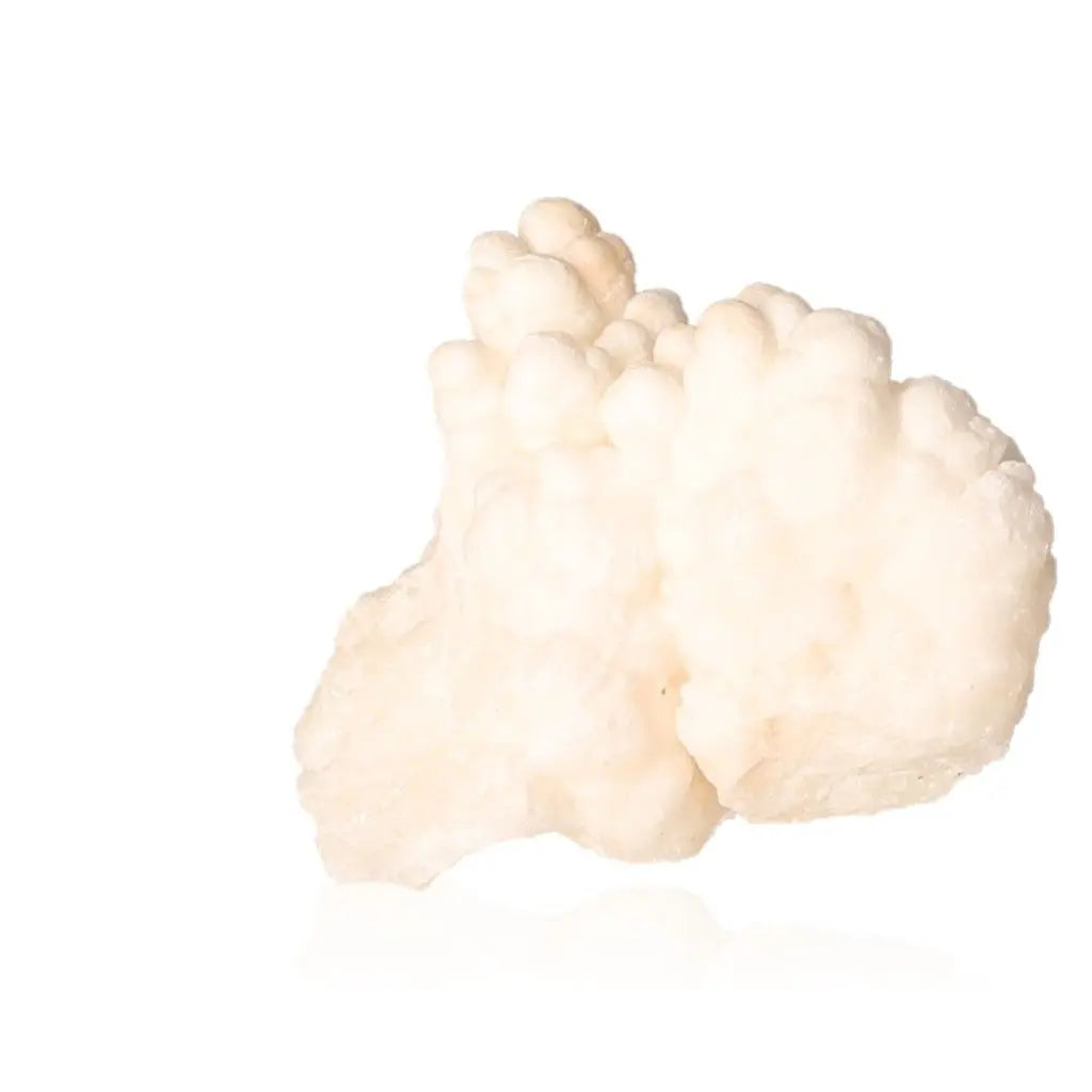 Ighoud Calcite Druze from Morocco featuring natural shapes, earthy tones, and grounding energy for spiritual growth and harmony.