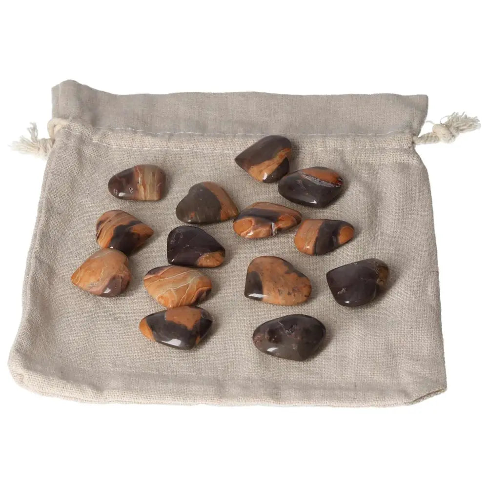 Jasper Tiger Small Heart stones displayed on a soft beige pouch, promoting harmony, stress reduction, and balance.
