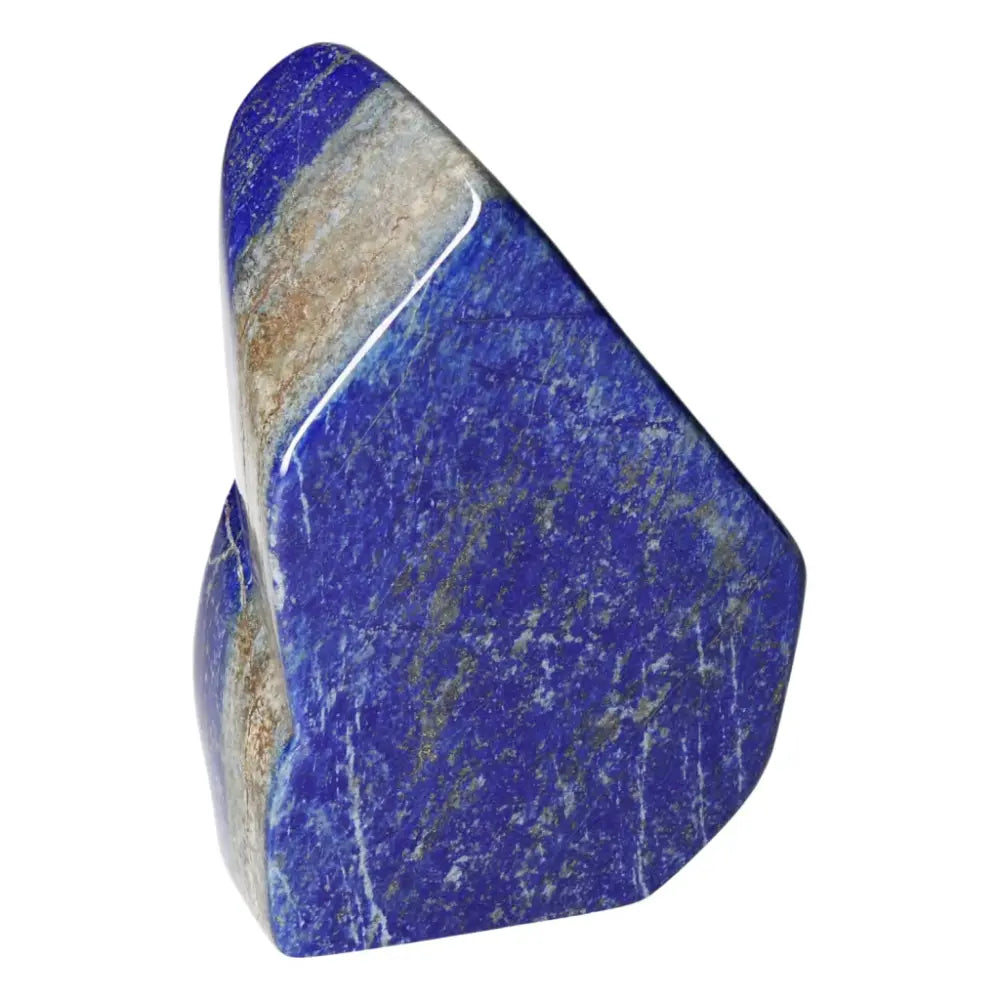 Lapis Lazuli Freeform crystal with deep blue hues and golden pyrite, sourced from Pakistan, symbolizes wisdom and inner power.