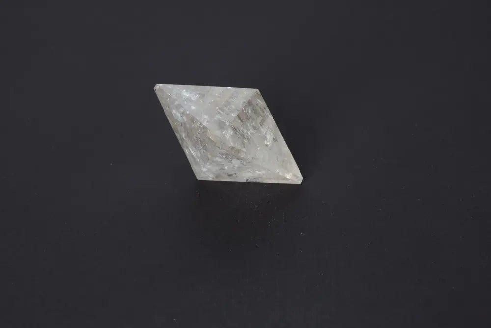 Lemurian Quartz Double Pyramid on black background showcasing sacred geometry and spiritual clarity.