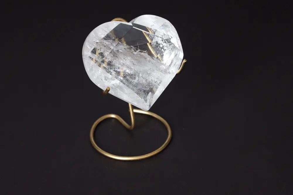 Lemurian Quartz Geometric Heart on stand showcasing elegant clarity and geometric design by Sylvia Crystals.