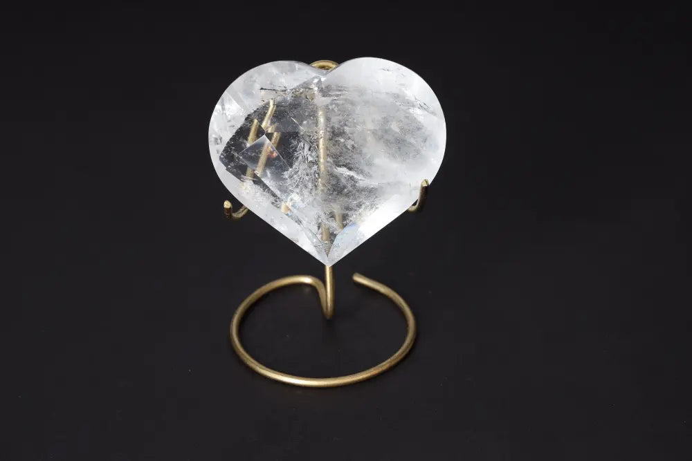 Lemurian Quartz Geometric Heart with elegant stand, showcasing its clear quartz brilliance and spiritual harmony.
