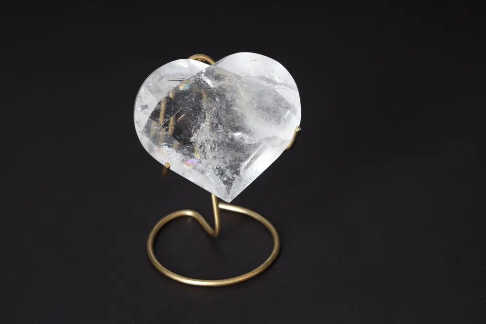 Lemurian Quartz Geometric Heart on stand, showcasing clear quartz elegance and spiritual harmony by Sylvia Crystals.