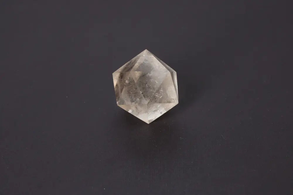 Lemurian Quartz Geometric Sphere, showcasing sacred geometry and ancient wisdom in a 5 cm crystal with ethereal clarity.