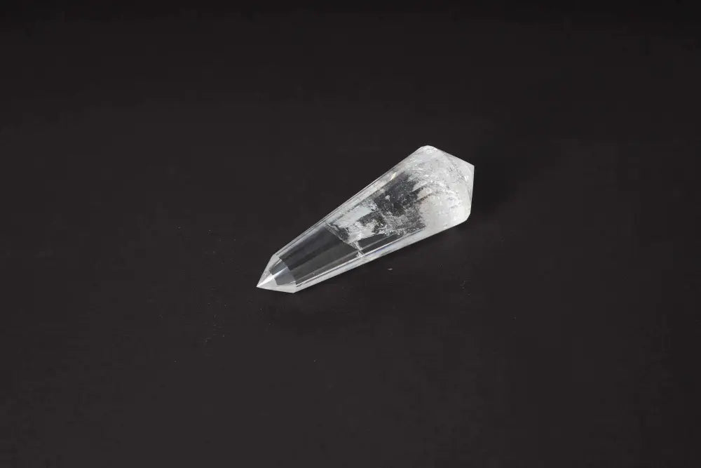 Lemurian Quartz Point crystal with horizontal striations, symbolizing ancient wisdom and energy from the mythical Lemurian civilization.
