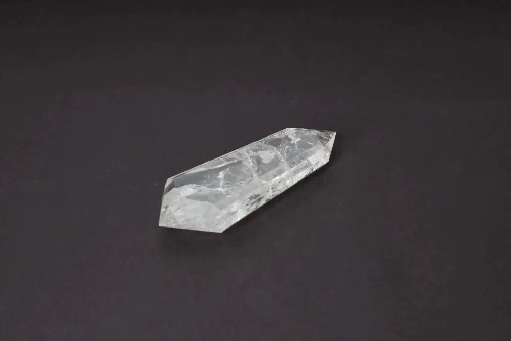 Lemurian Quartz Point crystal with distinct striations, believed to carry ancient wisdom from the mythical Lemurian civilization.