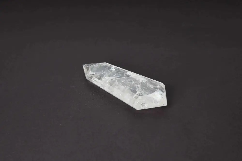 Lemurian Quartz Point crystal with horizontal striations, showcasing ancient wisdom and spiritual energy.