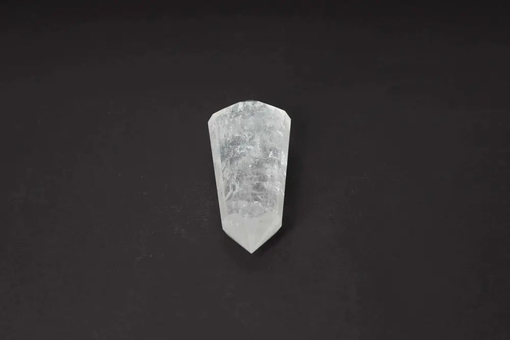 Lemurian Quartz Point crystal with distinct horizontal striations, symbolizing ancient wisdom from a mythical civilization.