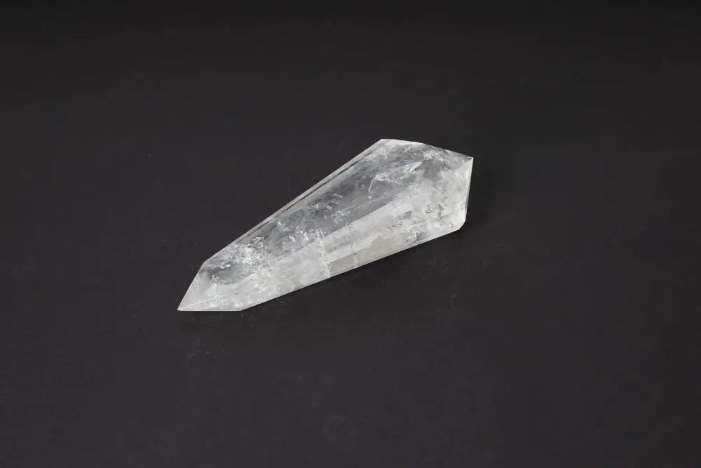 Lemurian Quartz Point with distinct striations, believed to carry ancient wisdom from the mythical Lemurian civilization.