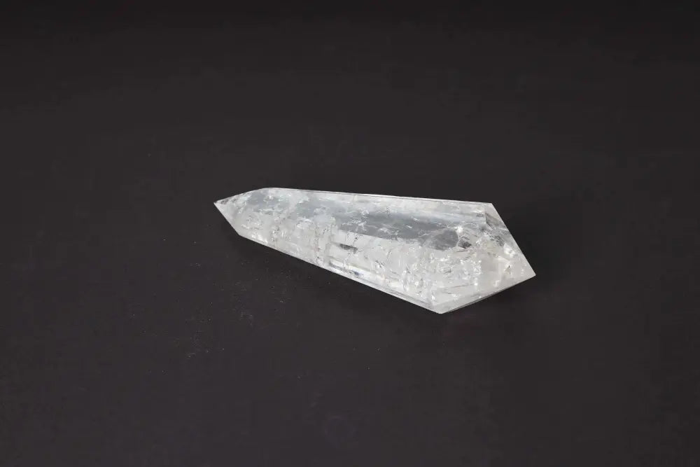 Lemurian Quartz Point crystal with horizontal striations, symbolizing ancient wisdom from mythical Lemurian civilization.