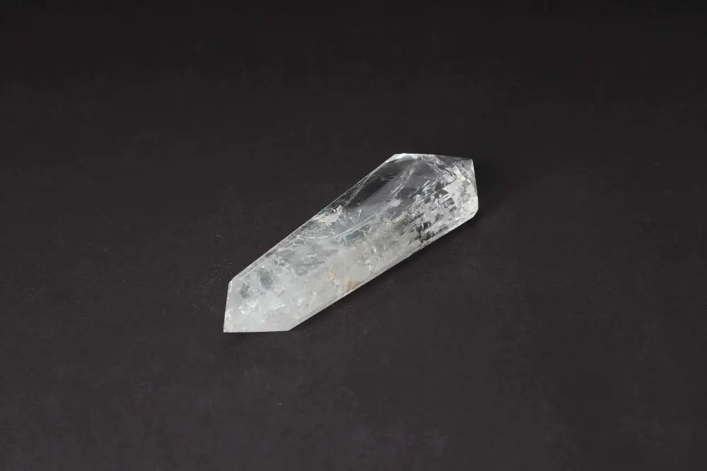 Lemurian Quartz Point with unique striations, symbolizing ancient wisdom and spiritual harmony. Perfect for crystal healing.
