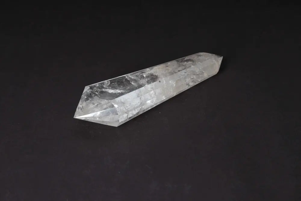 Lemurian Quartz Point with distinct horizontal striations, believed to hold ancient wisdom from the mythical Lemurian civilization.