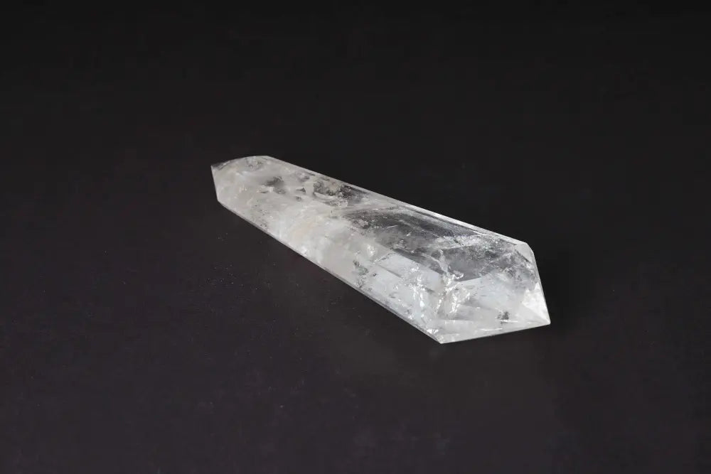 Lemurian Quartz Point crystal with distinct horizontal striations, believed to hold ancient wisdom and energies from the Lemurian civilization.