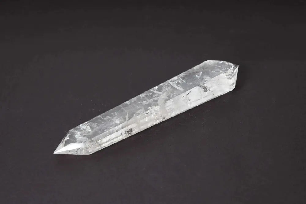 Lemurian Quartz Point with distinctive striations believed to hold ancient Lemurian wisdom, spiritual crystal for energy healing.