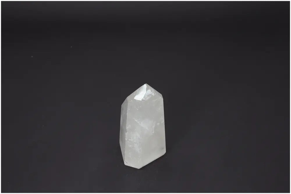Lemurian Quartz Obelisk from Sylvia Crystals, a symbol of spiritual harmony and luxury with powerful purifying properties.