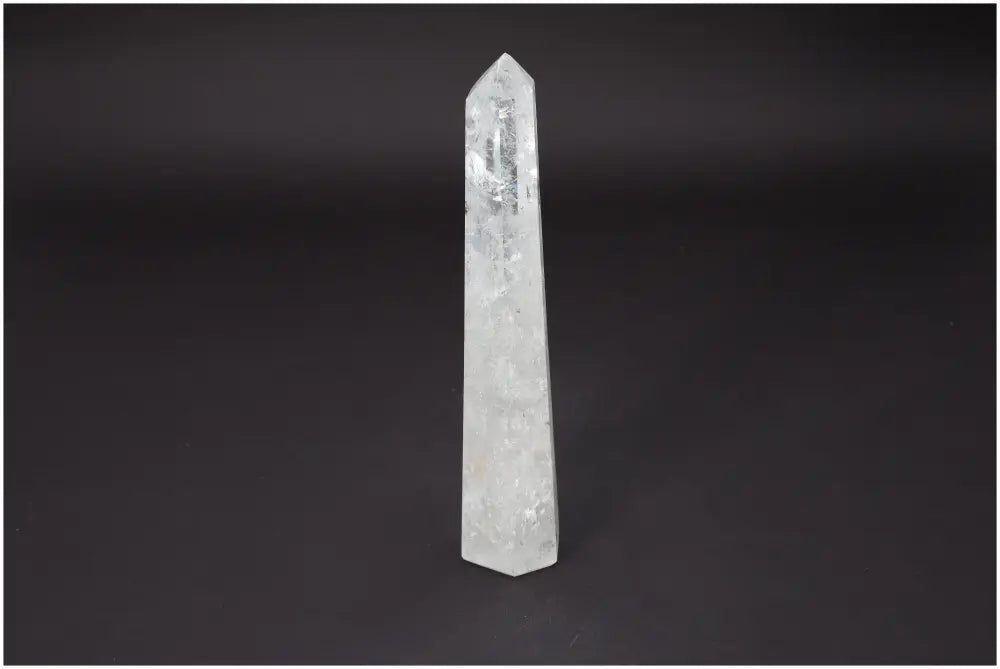 Lemurian Quartz Obelisk on black background, a spiritual crystal for tranquility and purification from Sylvia Crystals