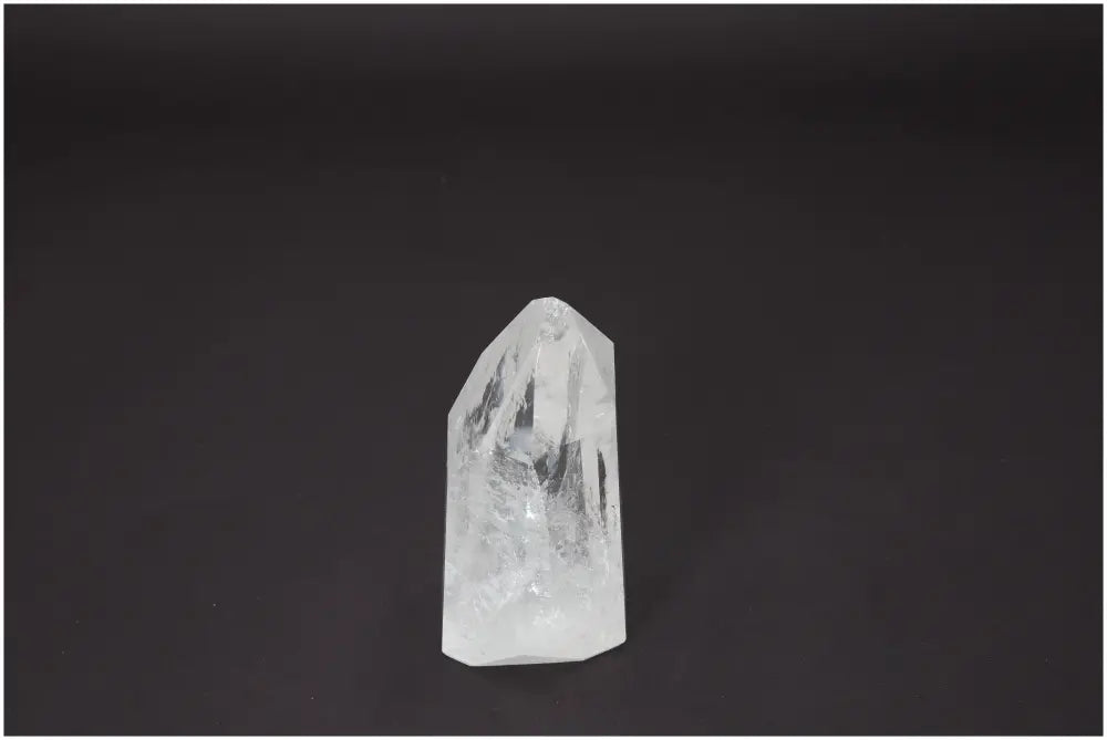 Lemurian Quartz Obelisk on dark background, showcasing unique crystal structure ideal for chakra and energy healing.