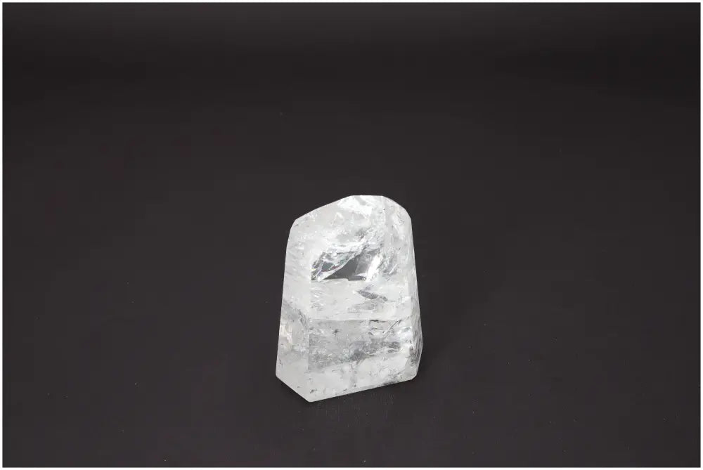 Lemurian Quartz Obelisk on black background, showcasing distinct characteristics for chakras and zodiac signs.