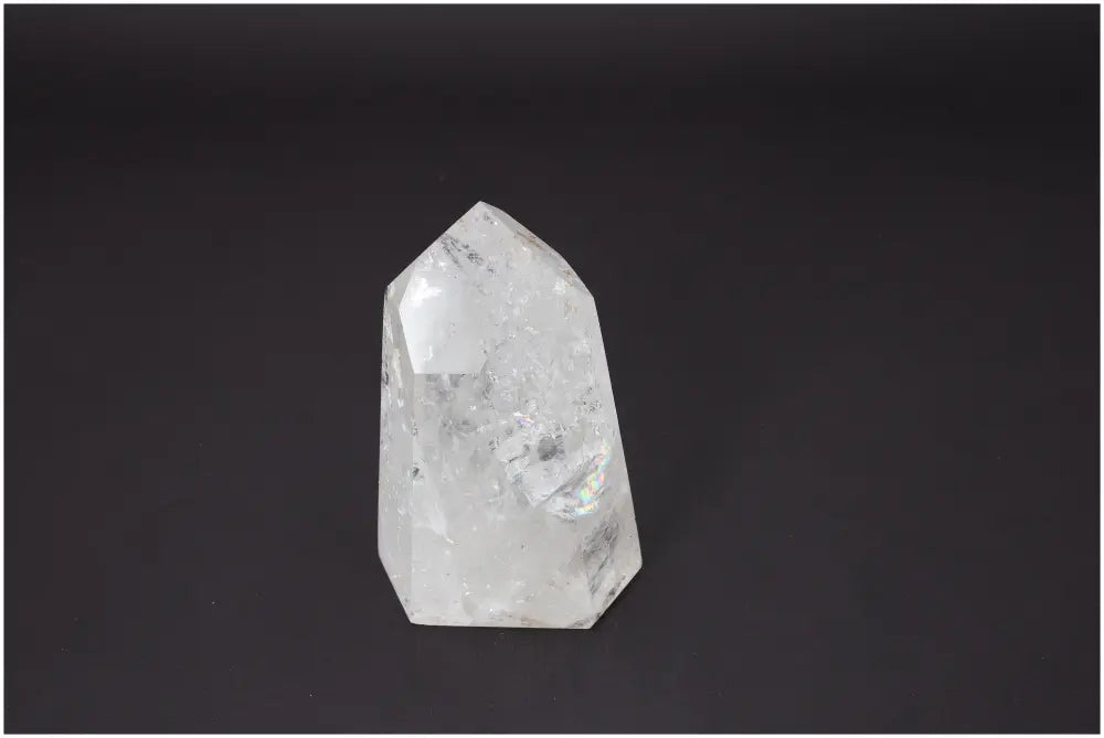 Lemurian Quartz Obelisk, clear crystal with unique properties, supports chakras and zodiac signs, enhances energy and spirituality.