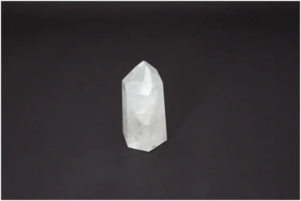 Lemurian Quartz Obelisk on black background, highlighting its unique properties for chakra and spiritual needs