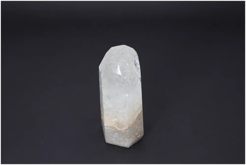 Lemurian Quartz Obelisk showcasing its natural variations, linked to chakras and zodiac signs for spiritual enhancement.