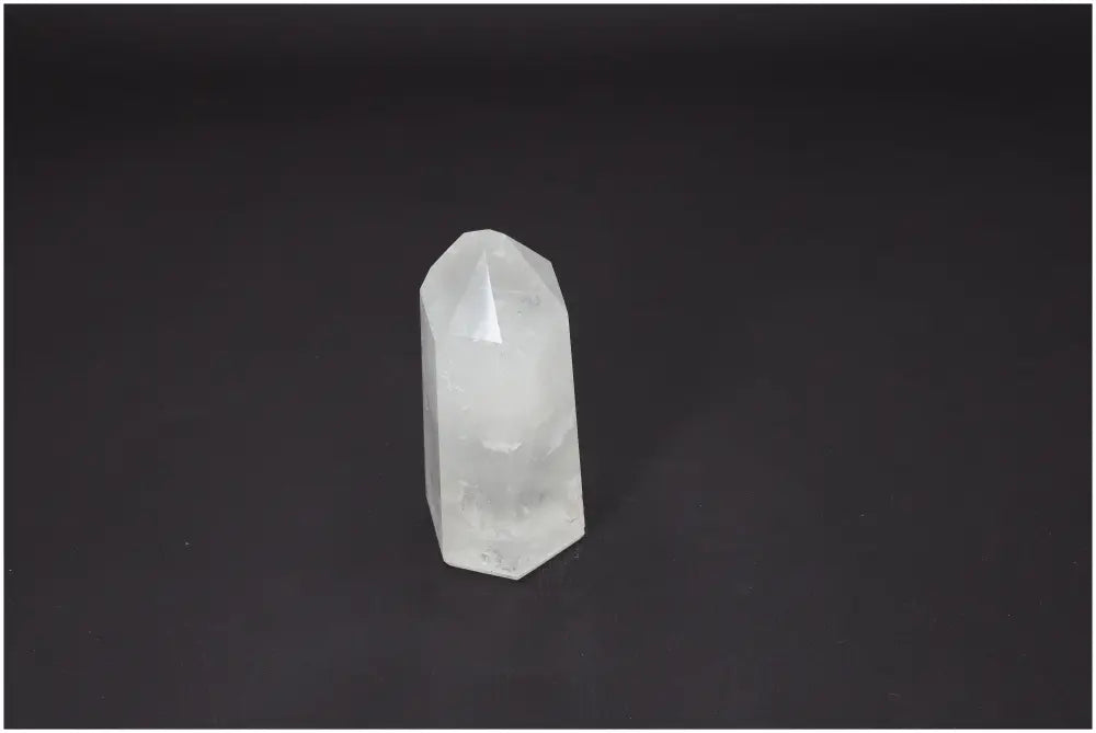 Lemurian Quartz Obelisk crystal on dark background, ideal for chakra alignment and zodiac energy support.