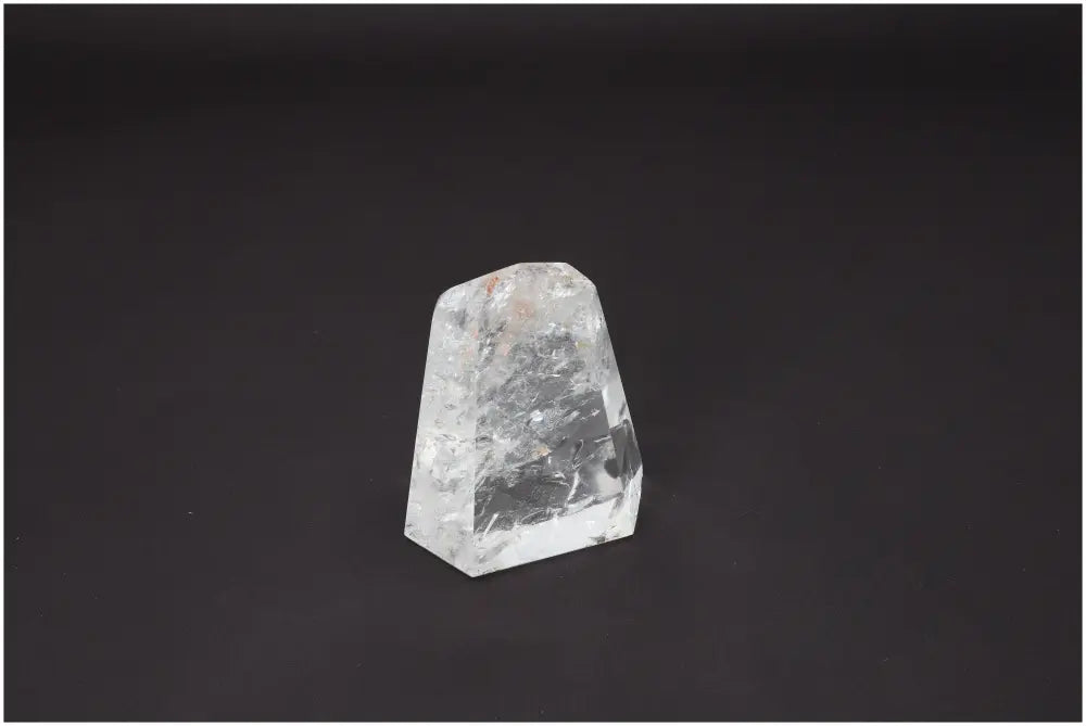 Lemurian Quartz Obelisk on black background, highlighting its unique spiritual properties related to chakras and zodiac signs.