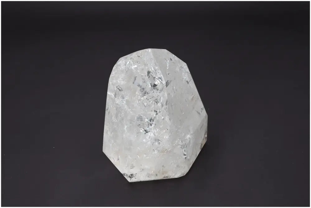 Lemurian Quartz Obelisk on black background, known for its unique properties that support energetic and spiritual needs.