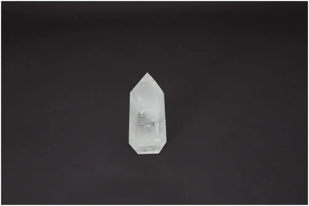 Lemurian Quartz Obelisk crystal on black background, ideal for chakra balancing and zodiac energy alignment.