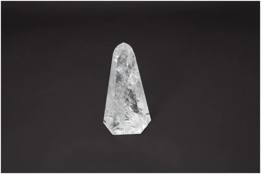 Lemurian Quartz Obelisk on a black background, showcasing its unique crystalline structure and spiritual properties.