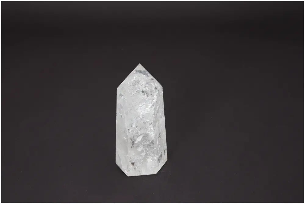 Lemurian Quartz Obelisk with unique chakra properties, enhancing spiritual energy and aligning with zodiac signs.