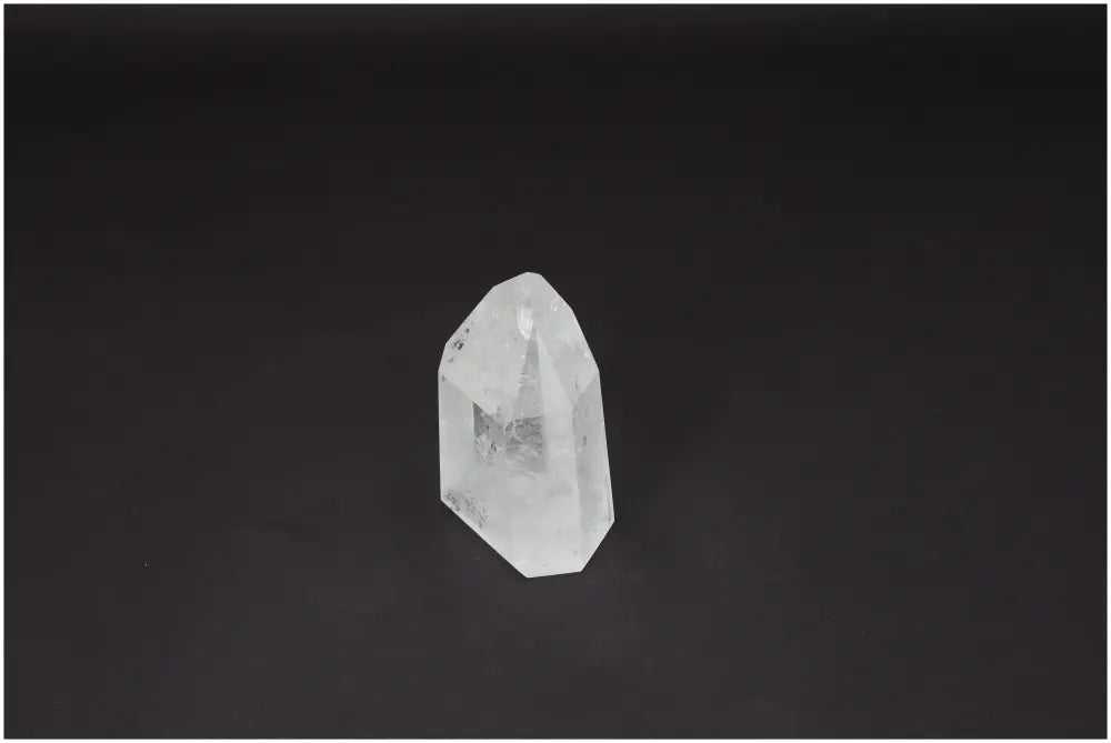 Lemurian Quartz Obelisk crystal for clarity, balance, and personal growth, known as Master Healer, on a black background.