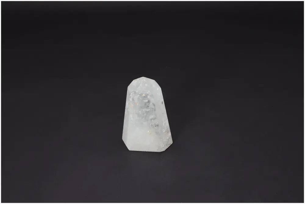 Lemurian Quartz Obelisk on black background, ideal for energy amplification and clarity, ethically sourced clear crystal stone.
